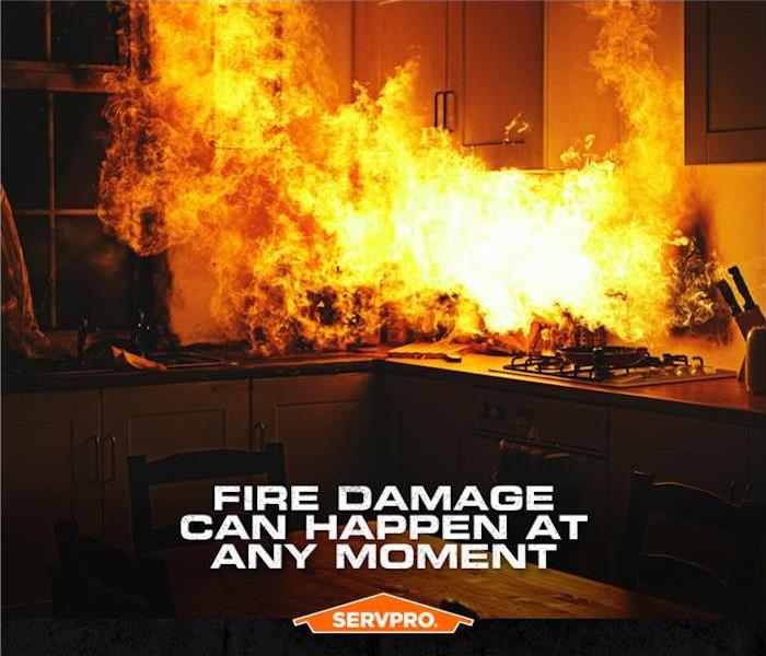 A kitchen on fire with the words "fire damage can happen at any moment" on top of it